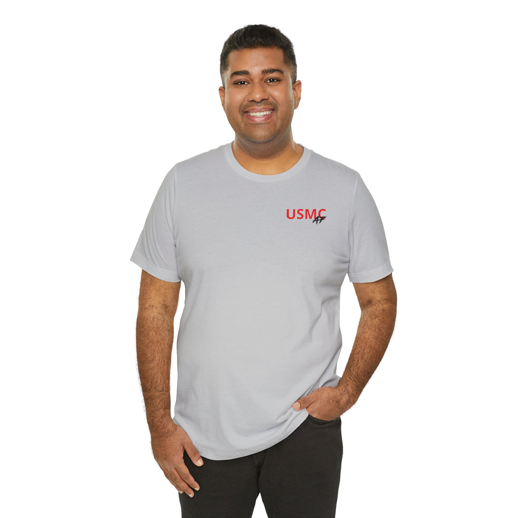 Smiling man wearing the Marine Corps veteran T-shirt in Solid Athletic Grey, front view
