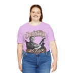 Woman in the Heather Prism Lilac Country As Fuck tee and blue jeans