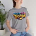 Athletic Heather t-shirt worn by a model, close-up of chest print showing graffiti Brooklyn AF lettering and skyline.