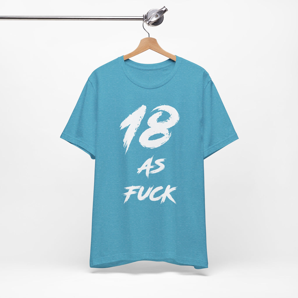 Heather Aqua birthday tee hanging on a hanger, white 18 AS FUCK graphic facing front
