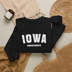 Black Iowa crewneck styled flat with a knit throw and rattan basket, varsity IOWA over FOREVER HAWKEYE