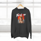 Charcoal Heather Feral AF hoodie hanging on a wooden hanger in front of a window