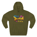 Army green Brooklyn As Fuck hoodie, flat lay front view, with graffiti-style lettering over a colorful NYC skyline print.