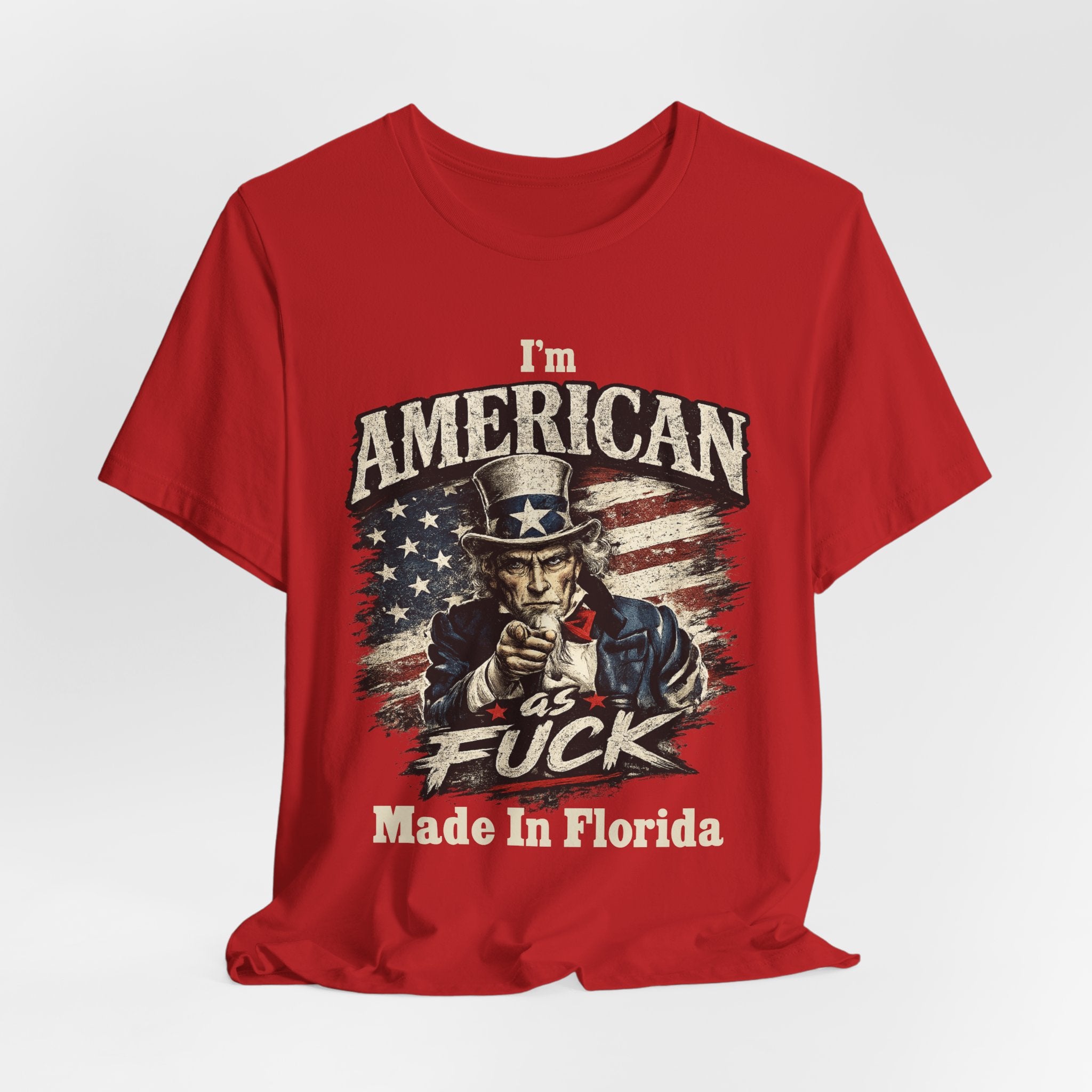 Red t-shirt draped over a form with natural wrinkles, showing the full Uncle Sam graphic