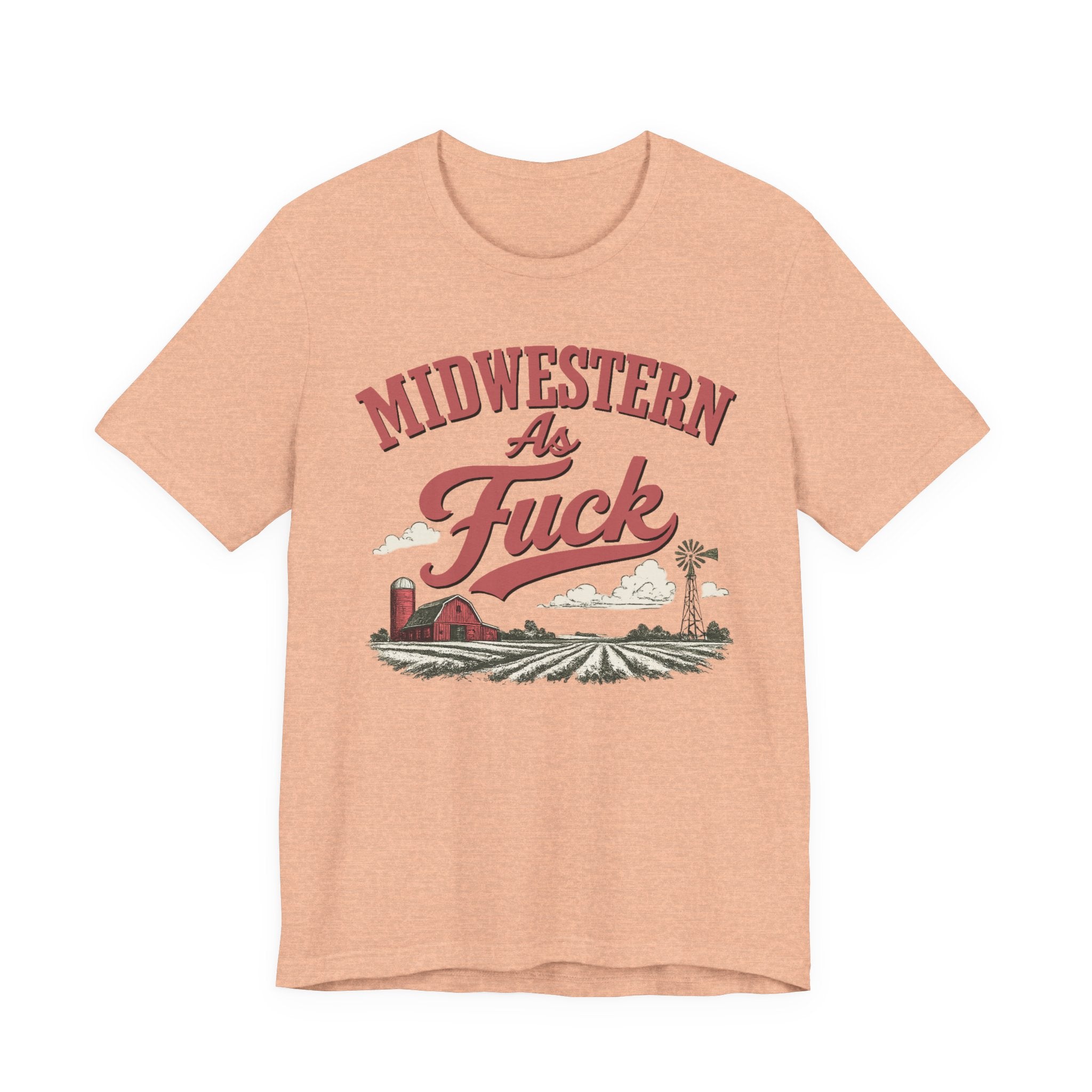 Heather peach Midwestern As Fuck t-shirt laid flat, showing the red barn, windmill, and farmland graphic.