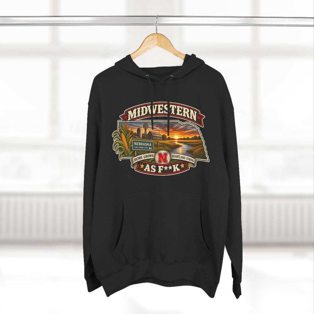Black Nebraska As F**K hoodie on a wooden hanger by a bright window