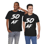 Two men standing together in black 50 AF birthday t-shirts and jeans