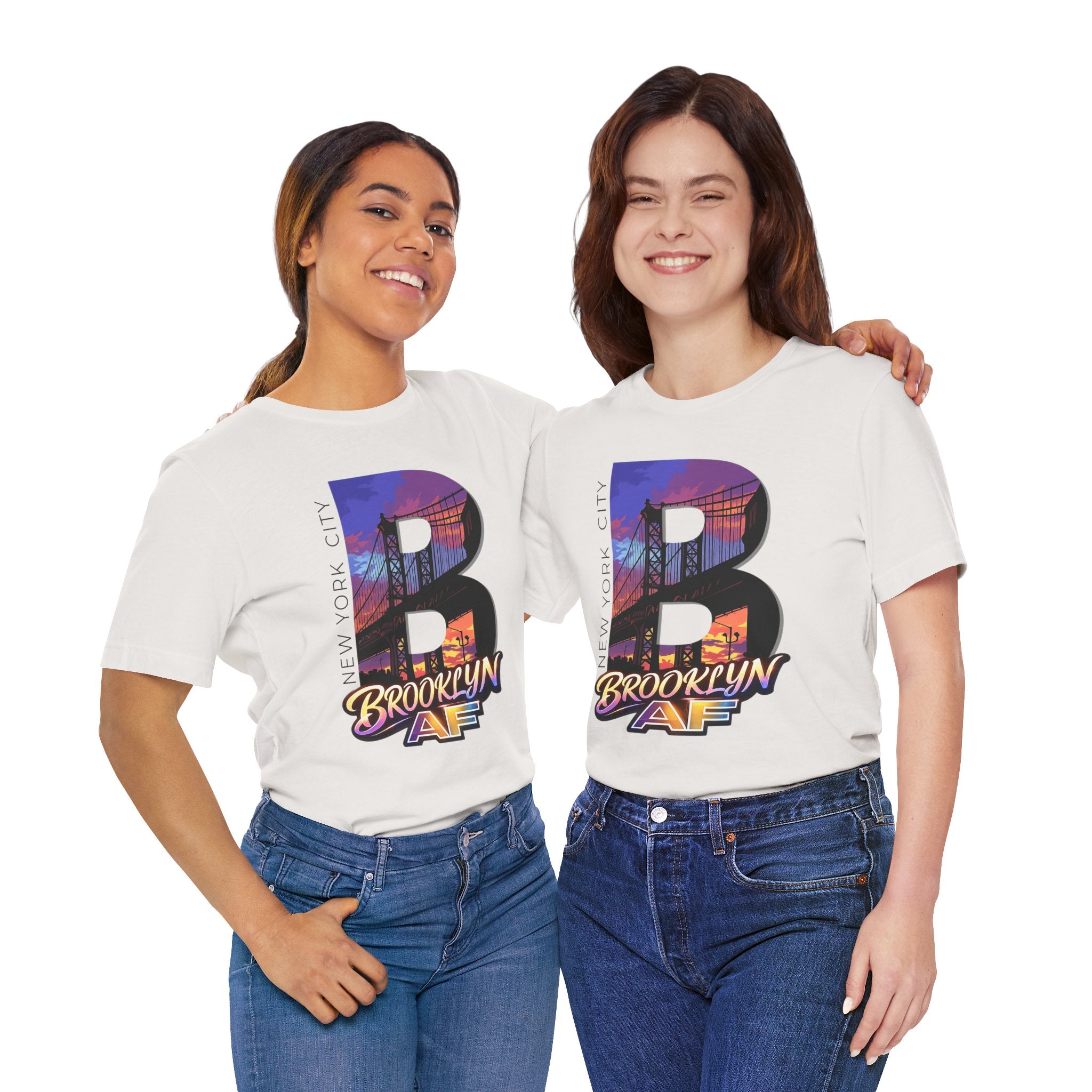 Two models in White tees, front view, wearing the oversized "B" Brooklyn Bridge sunset skyline graphic.
