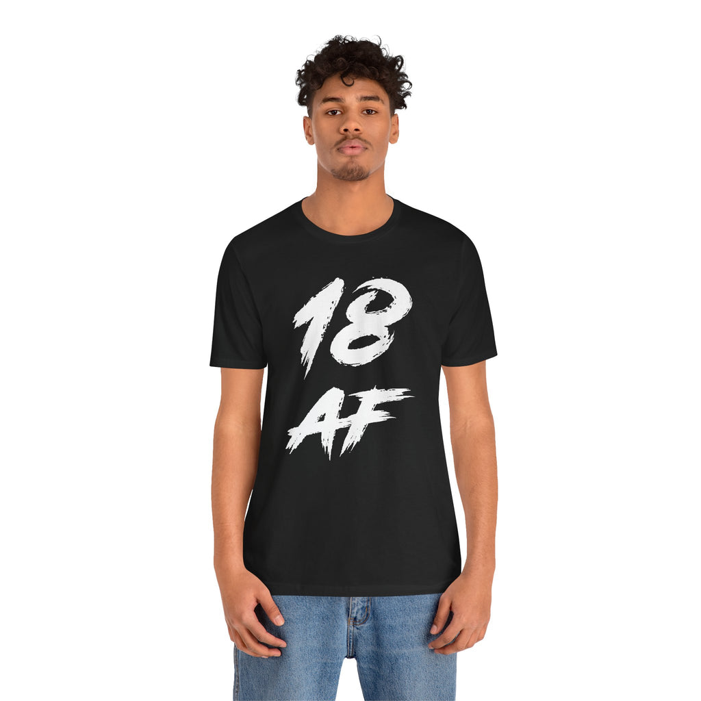 Young man wearing the black 18 AF birthday t-shirt with jeans, front view