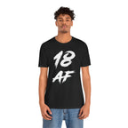 Young man wearing the black 18 AF birthday t-shirt with jeans, front view