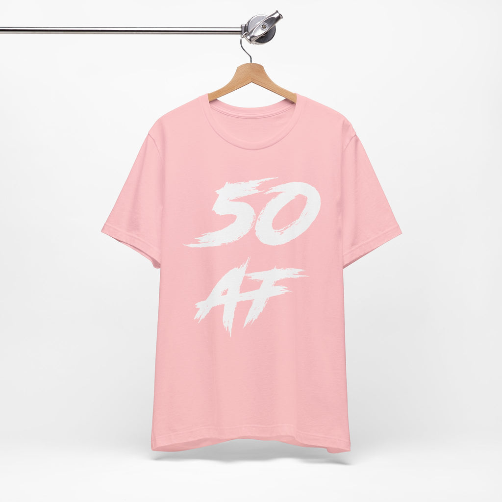 Pink birthday t-shirt on a hanger with the white 50 AF brush print