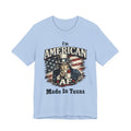 Baby blue flat lay tee with the Uncle Sam graphic and 'I'm American AF, Made In Texas' text