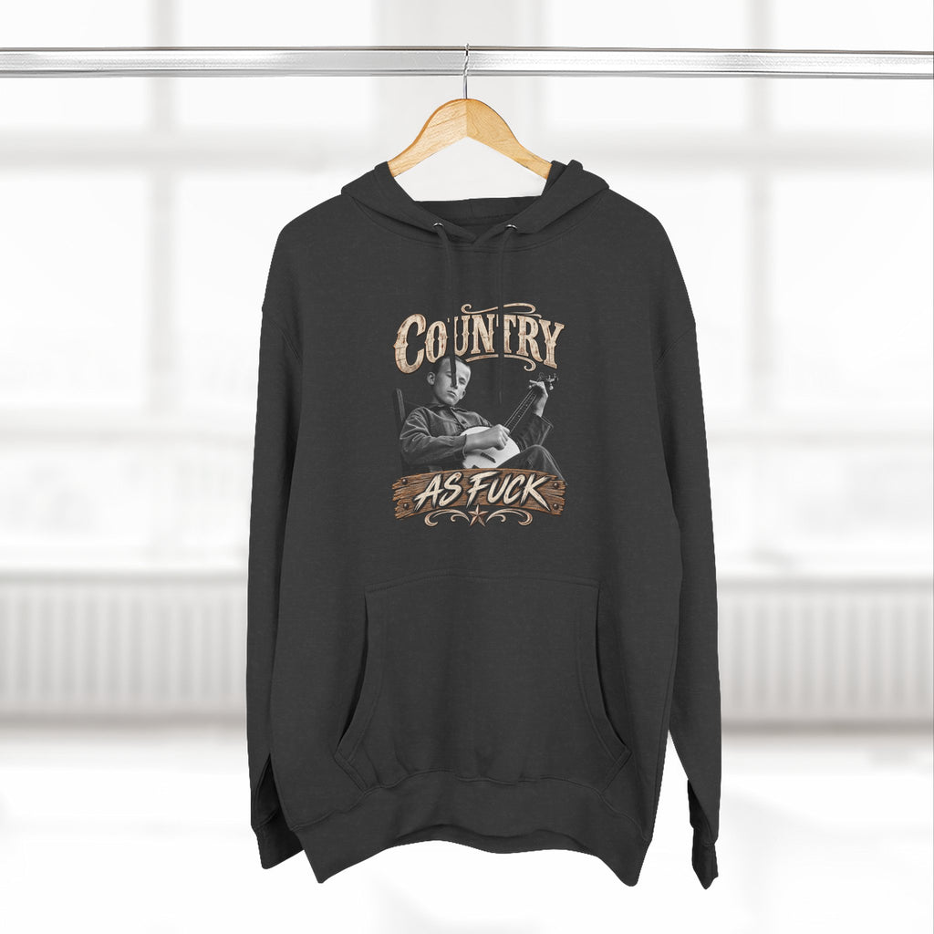 Charcoal Heather Country As Fuck hoodie on a wooden hanger, front print showing