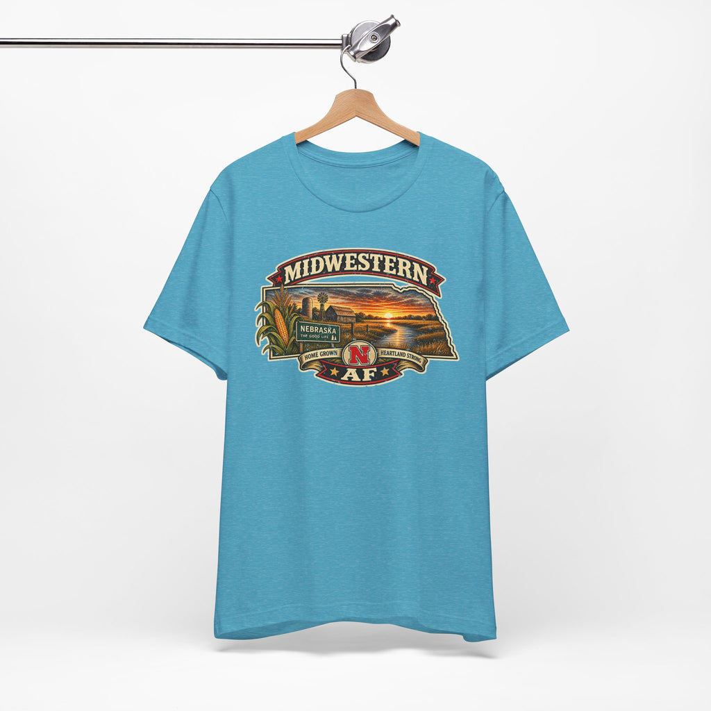 Heather aqua Nebraska T-shirt on a hanger with the Nebraska sunset graphic centred on the chest