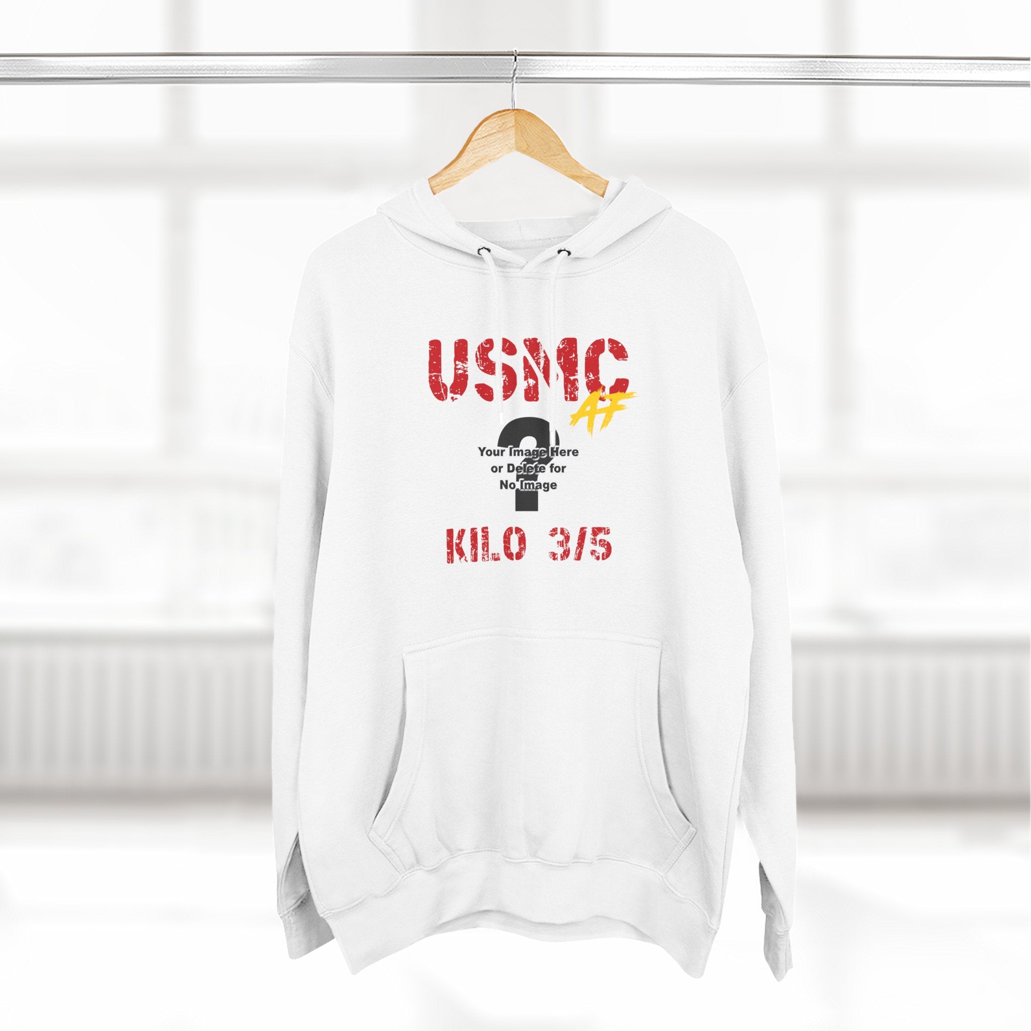 Personalized USMC Marine Corps AF hoodie in White on a wooden hanger in a bright room