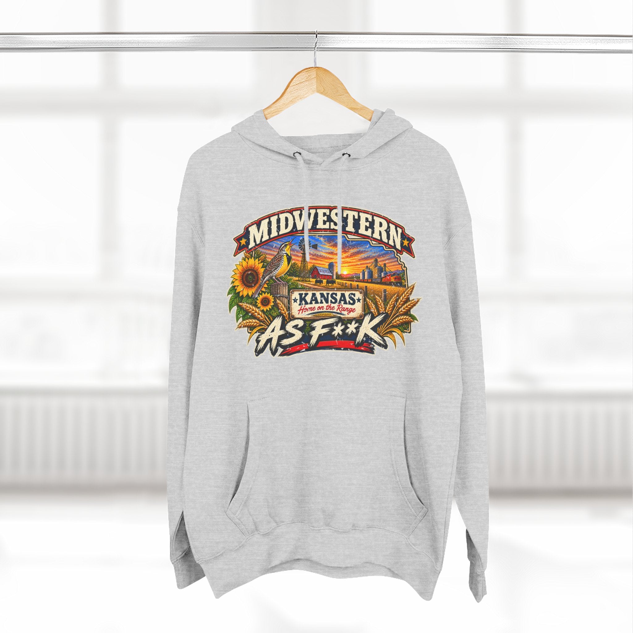 Heather grey Kansas As F**K hoodie on a hanger with the sunflower sunset badge