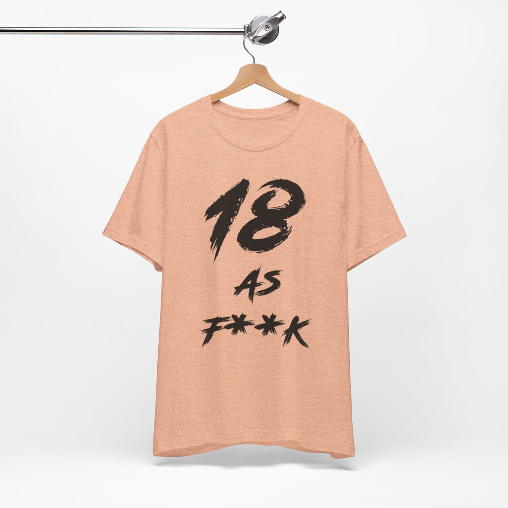 Heather Peach birthday tee on a wooden hanger showing the black front print
