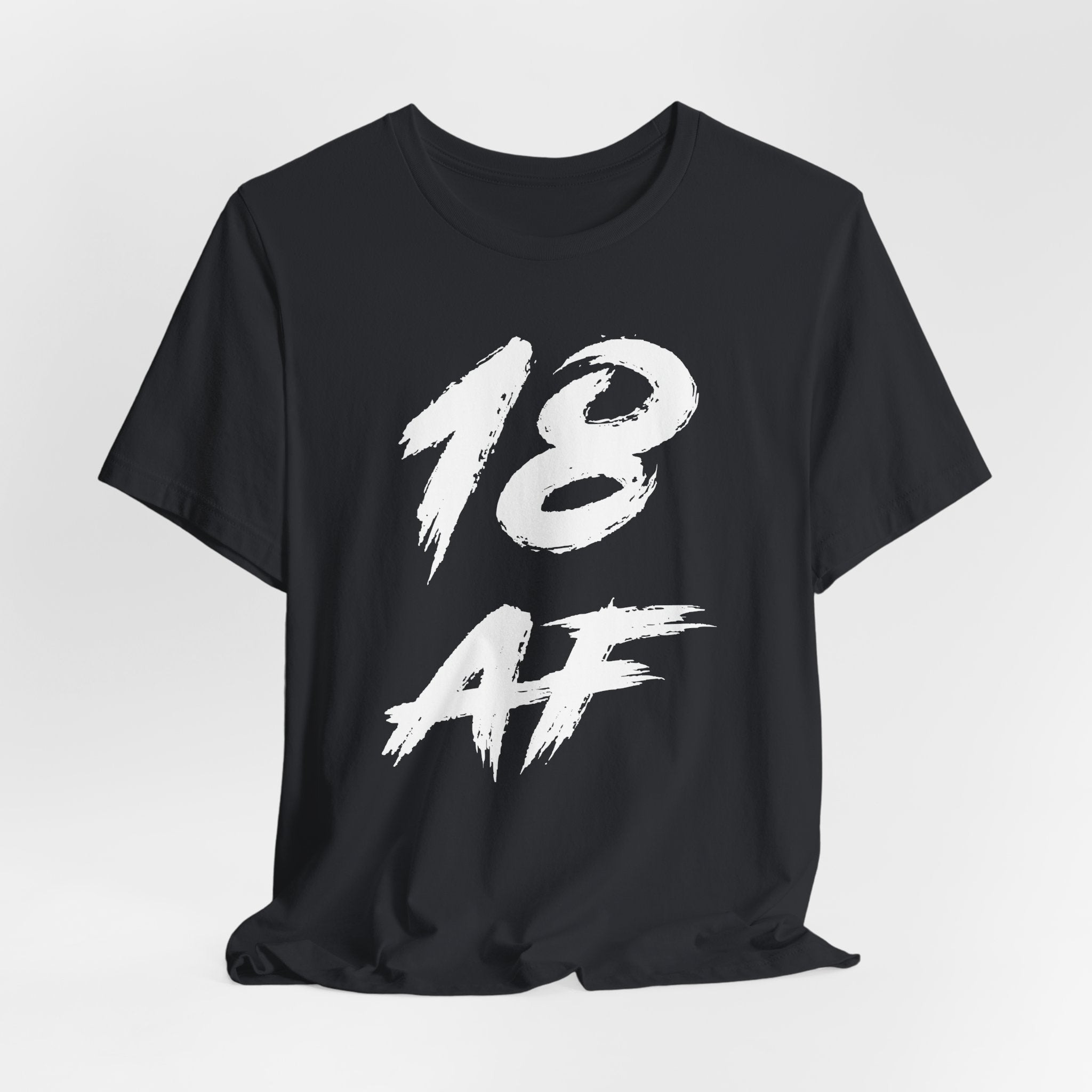 Vintage Black birthday t-shirt laid flat and rumpled, white 18 AF chest graphic