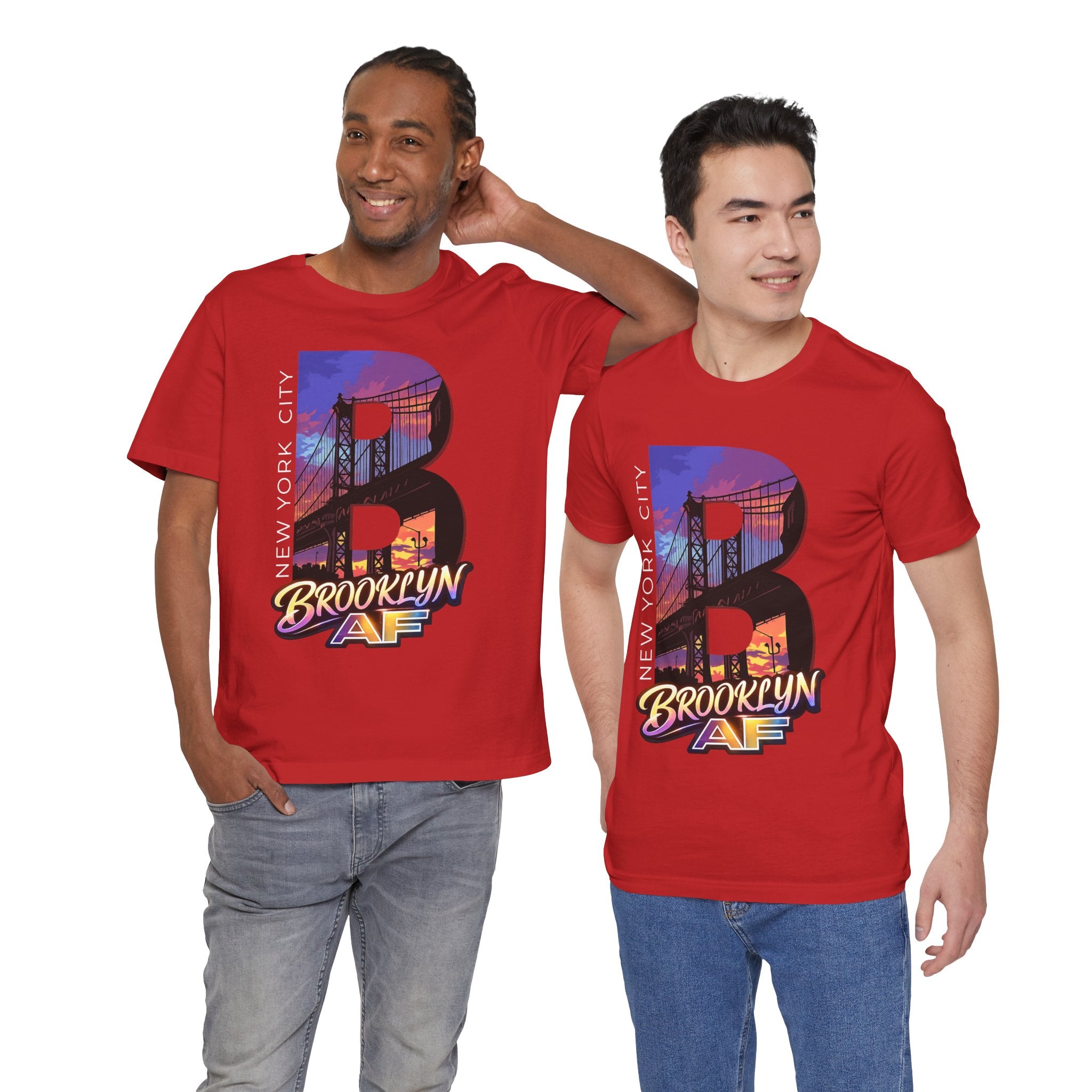 Two models wearing red t-shirts, front view, both featuring the 'B' Brooklyn Bridge sunset skyline graphic