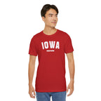 Man wearing the red Iowa pride tee, white varsity IOWA over a custom CEDAR RAPIDS line