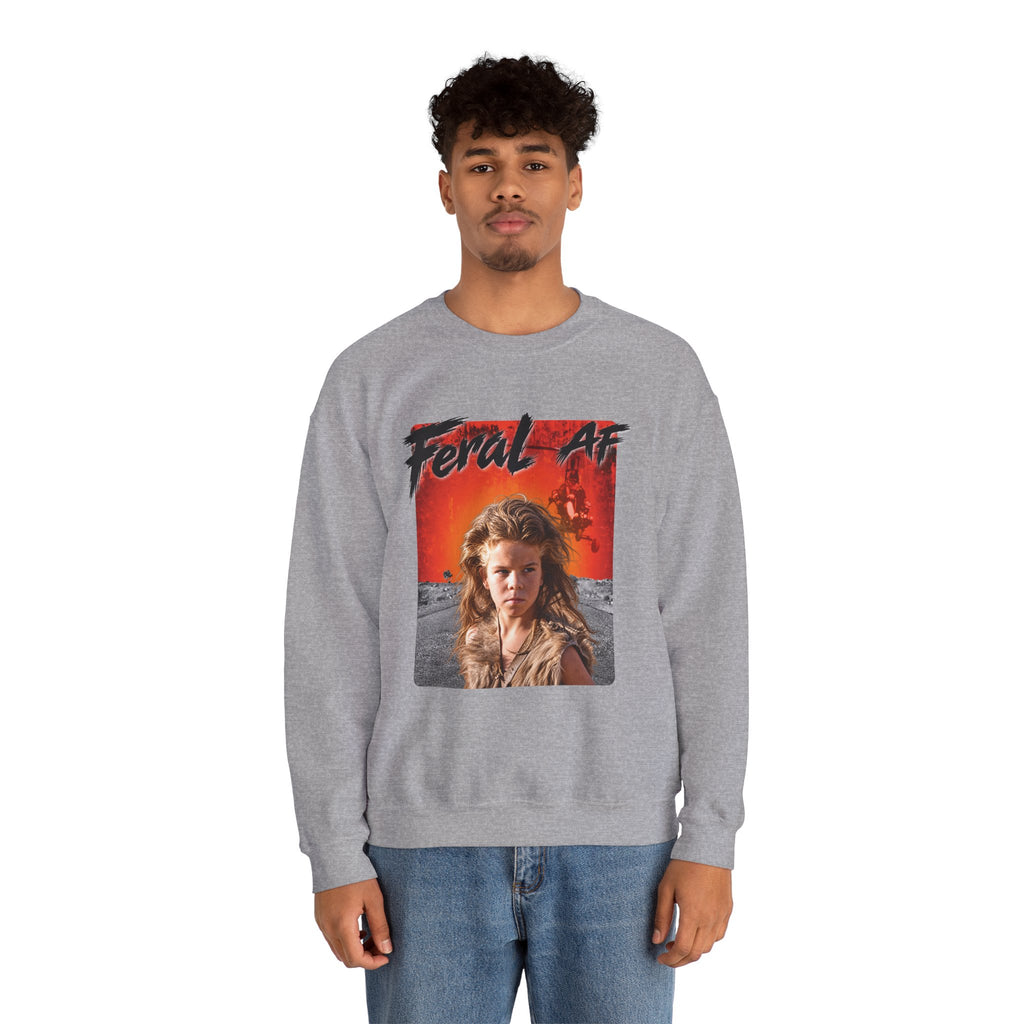 Man wearing the Sport Grey Feral AF sweatshirt with jeans, front print centred on the chest