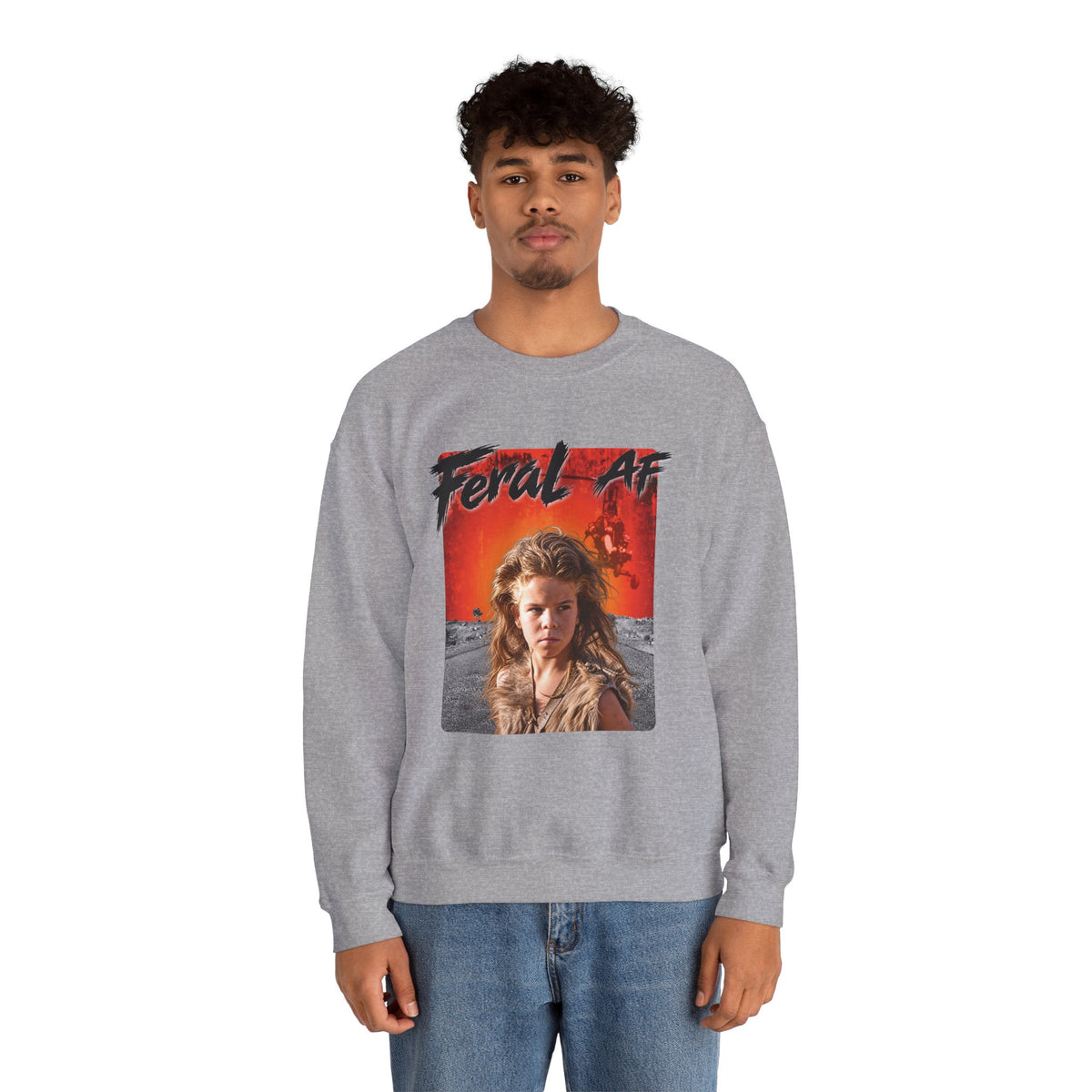 Man wearing the Sport Grey Feral AF sweatshirt with jeans, front print centred on the chest