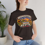 Woman in the brown Kansas As F**K tee indoors, censored banner across the chest