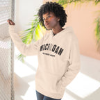 Woman leaning in a doorway wearing the oatmeal Michigan hoodie printed WELP MIDWEST GOODBYE