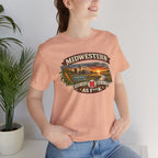 Close crop of the heather peach Nebraska As F**K tee worn by a model