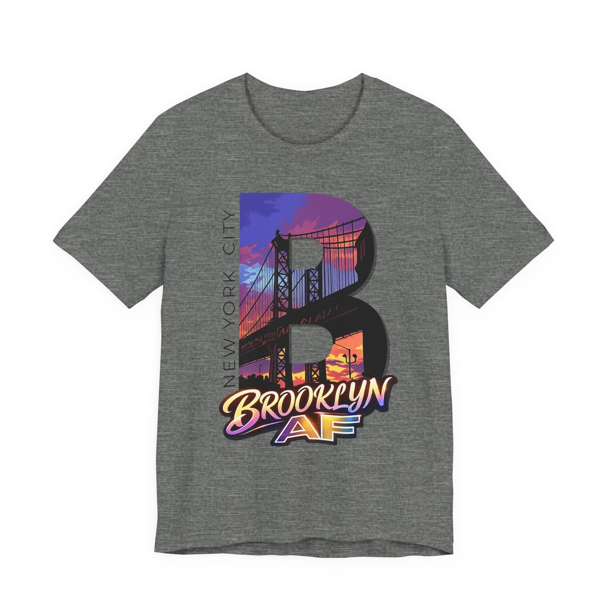 Dark grey heather t-shirt, flat lay, with a bold "B" Brooklyn Bridge sunset skyline graphic.
