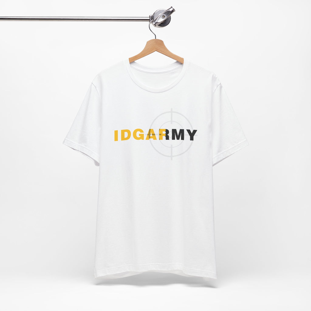 White IDGAF Army T-shirt on a wooden hanger against a pale wall, front print centred
