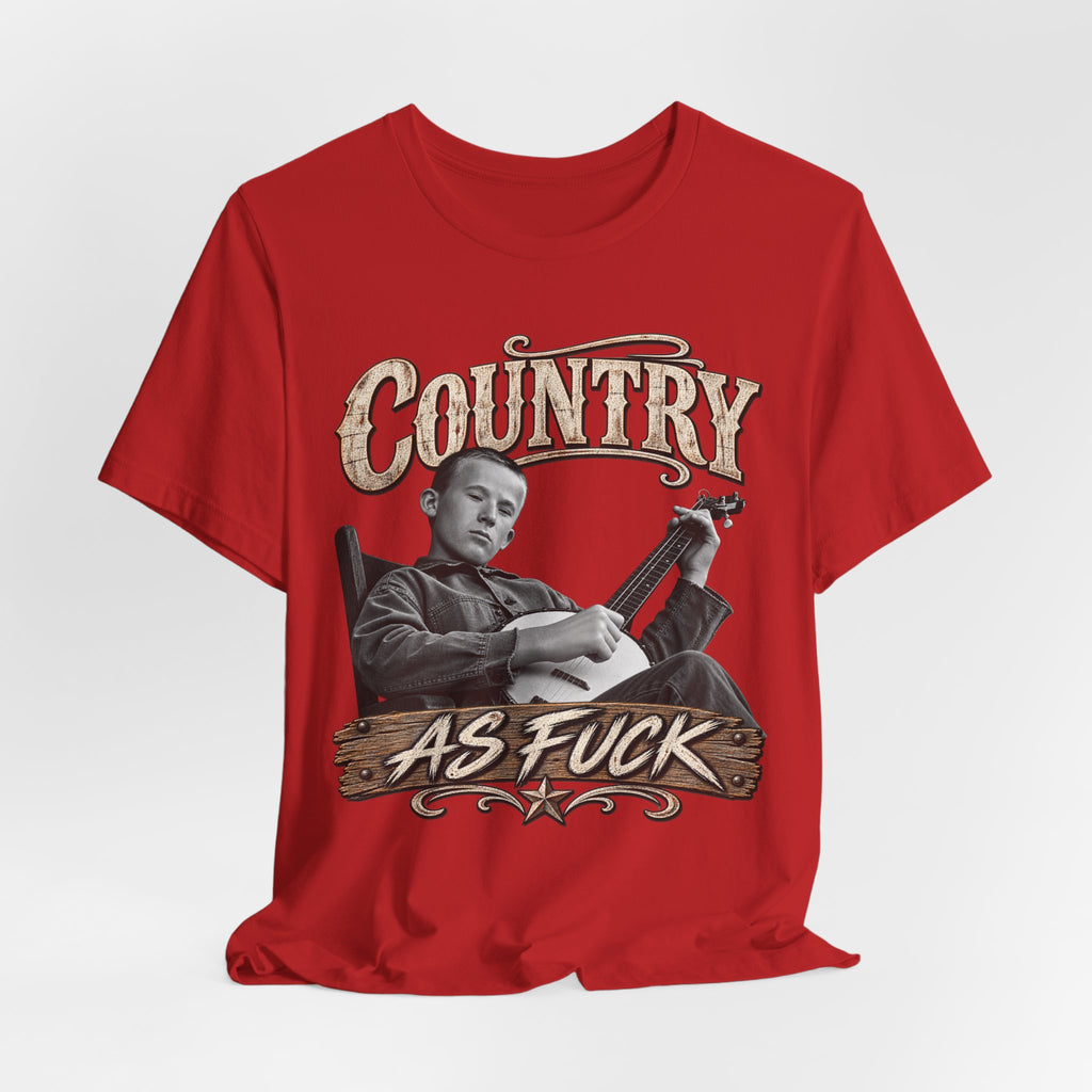 Red Country As Fuck tee laid flat, distressed banjo-player front graphic