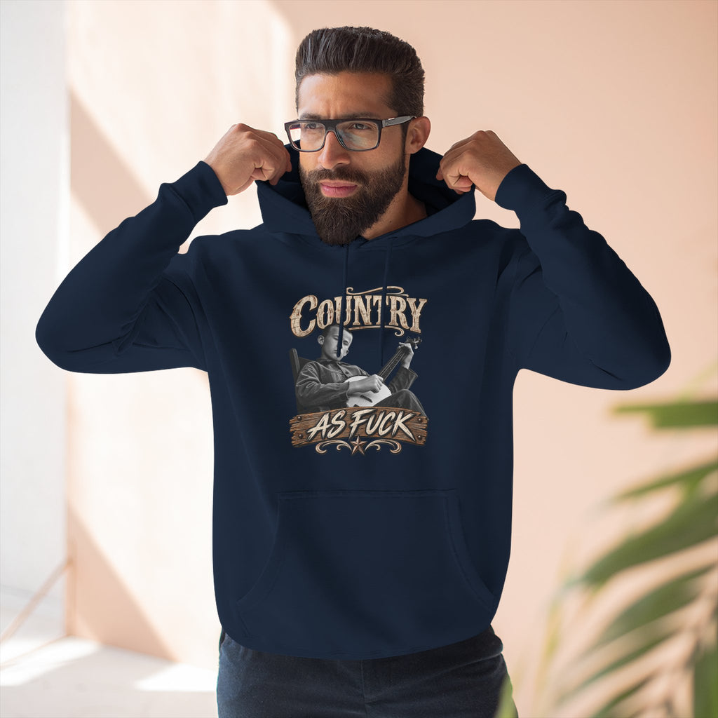Bearded man in the Navy Country As Fuck hoodie, hands at the hood