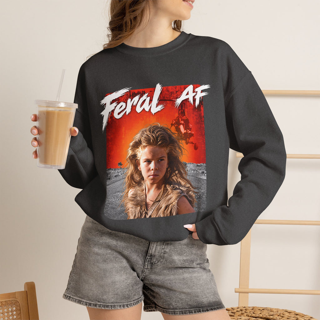 Woman wearing the Dark Heather Feral AF crewneck with an iced coffee, charcoal fabric