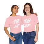 Two women arm in arm in matching pink 18 AF birthday tees
