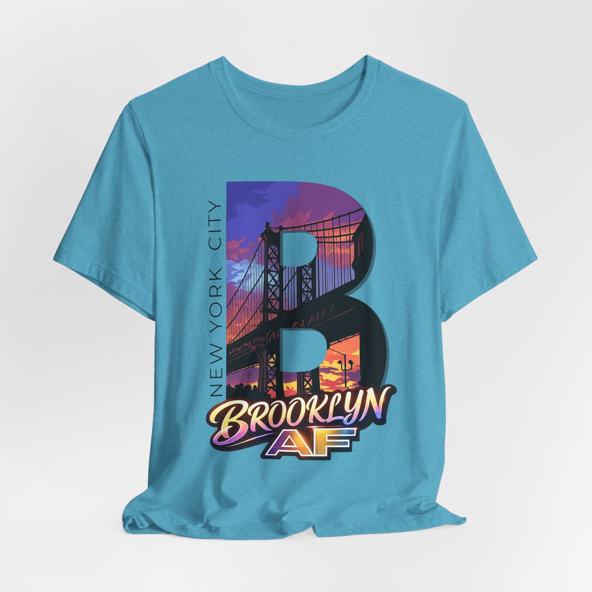 Heather Aqua tee, flat lay, front view, with the oversized "B" Brooklyn Bridge sunset skyline graphic and logo.