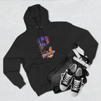 Black hoodie flat lay paired with jeans, a white belt, and sneakers, featuring the oversized "B" skyline graphic.