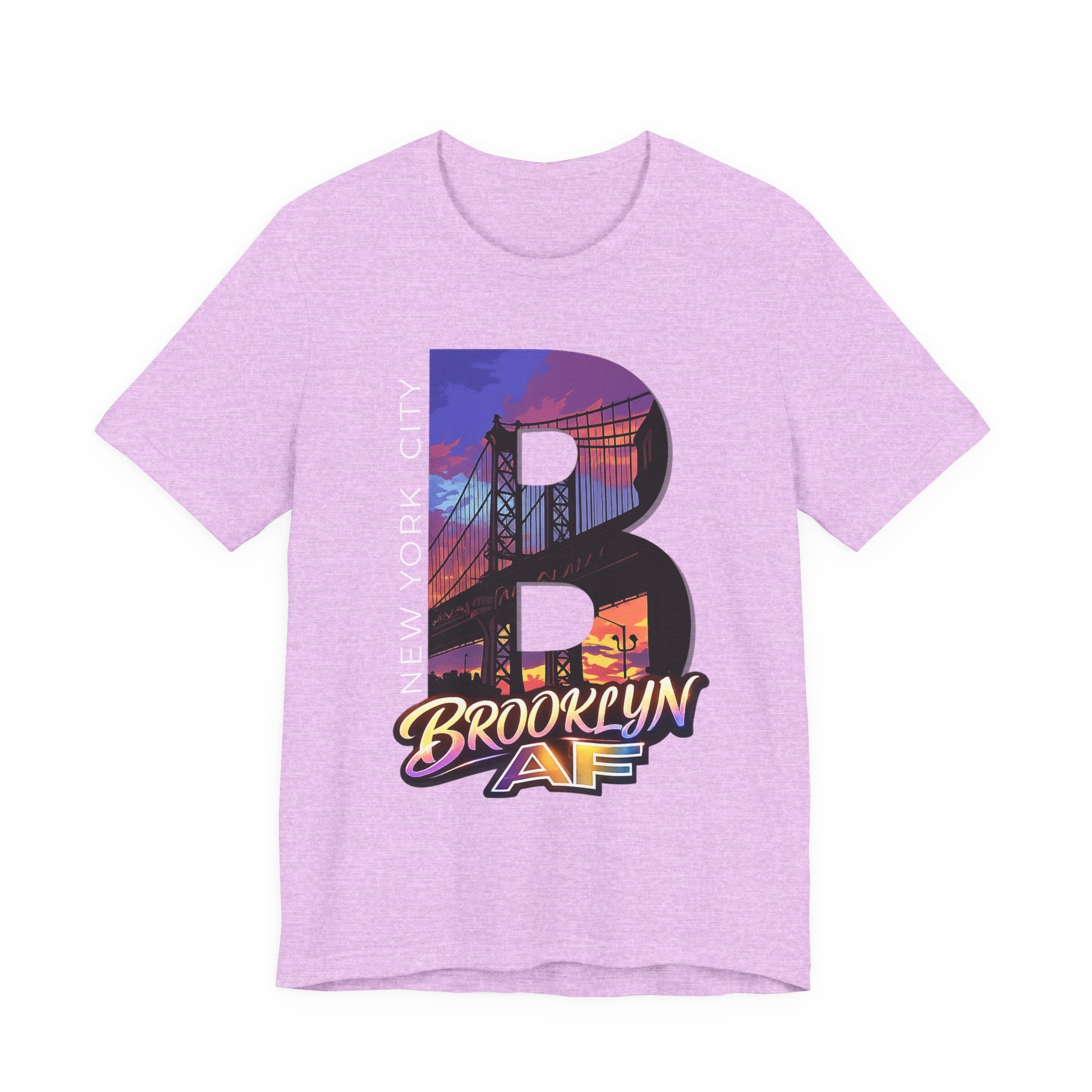 Heather prism lilac t-shirt, flat lay front view, with a bold B and a purple-orange Brooklyn Bridge sunset skyline graphic.