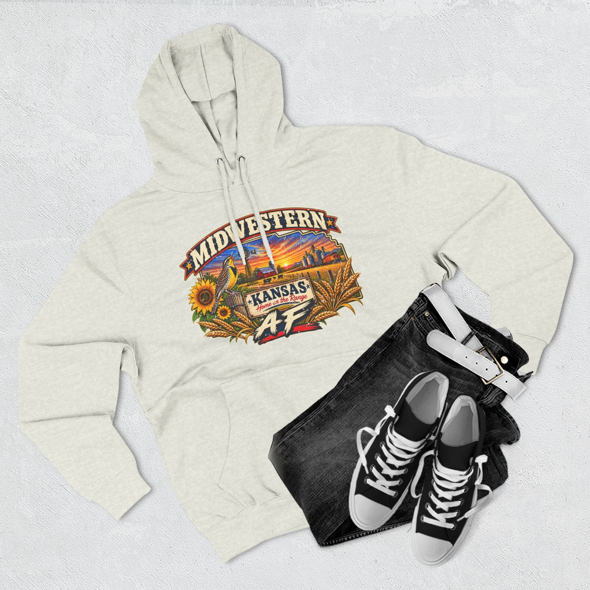 Oatmeal heather Kansas AF hoodie flat-lay with dark jeans and sneakers