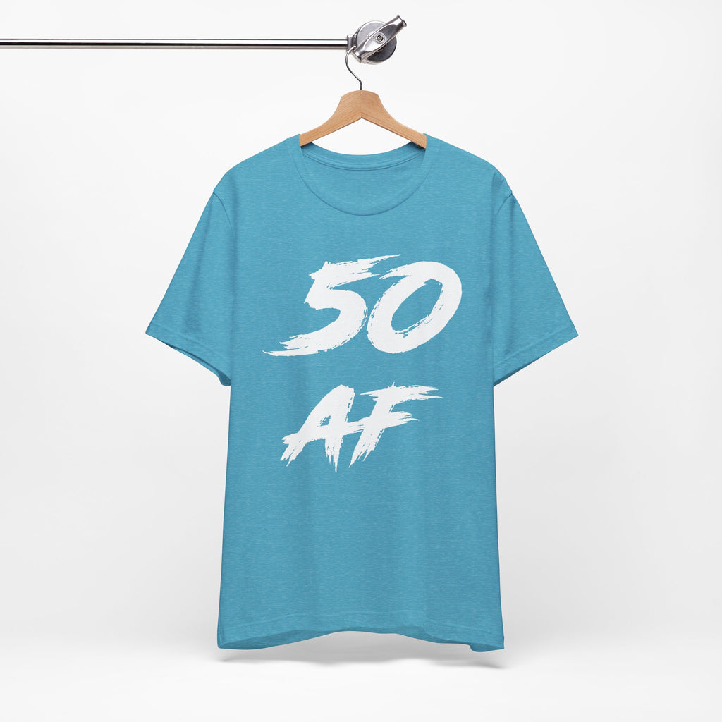 Heather Aqua birthday tee hanging on a hanger with the white 50 AF graphic facing front