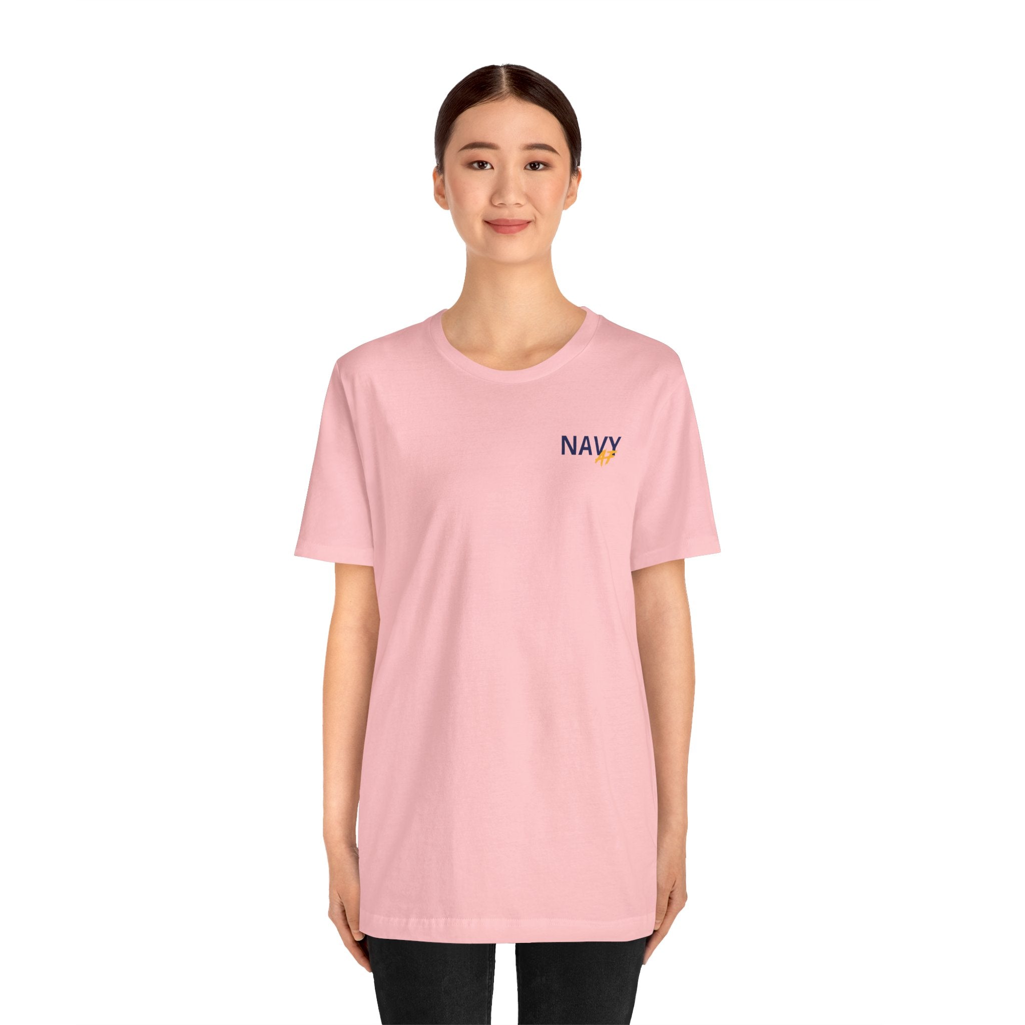 Woman wearing the personalized Navy veteran T-shirt in Pink, full-length studio shot