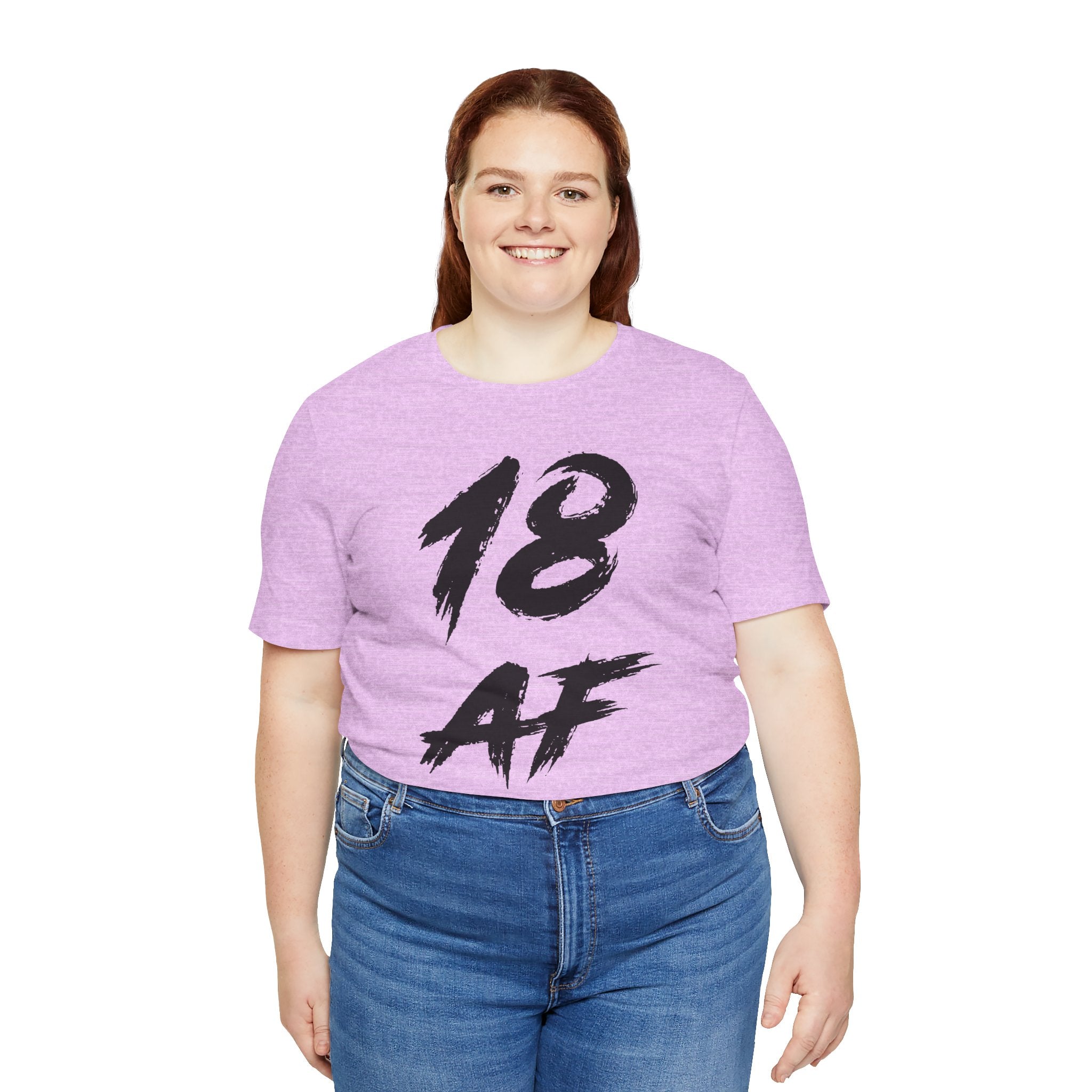 Smiling woman in the Heather Prism Lilac tee with the black 18 AF print