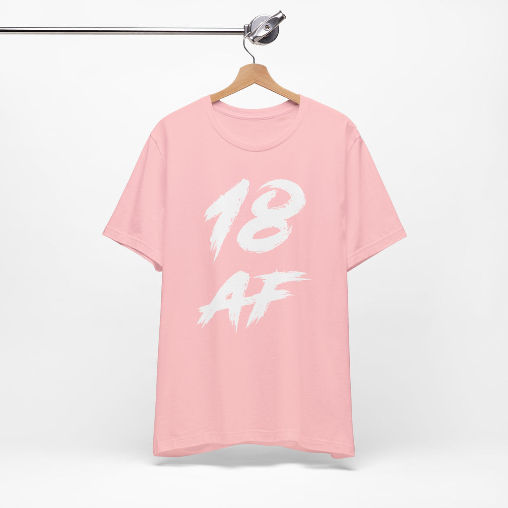 Pink birthday t-shirt on a hanger with the white 18 AF brush print