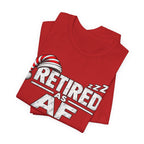 Red Retired AF tee folded with the sleeping-cap lettering running across the fold