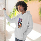 Heather grey hoodie worn by a model against a window, oversized B with a Brooklyn Bridge sunset skyline graphic.