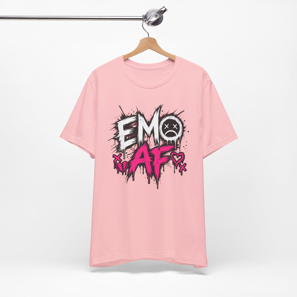 Pink EMO AF T-Shirt on a wooden hanger, front punk graphic visible