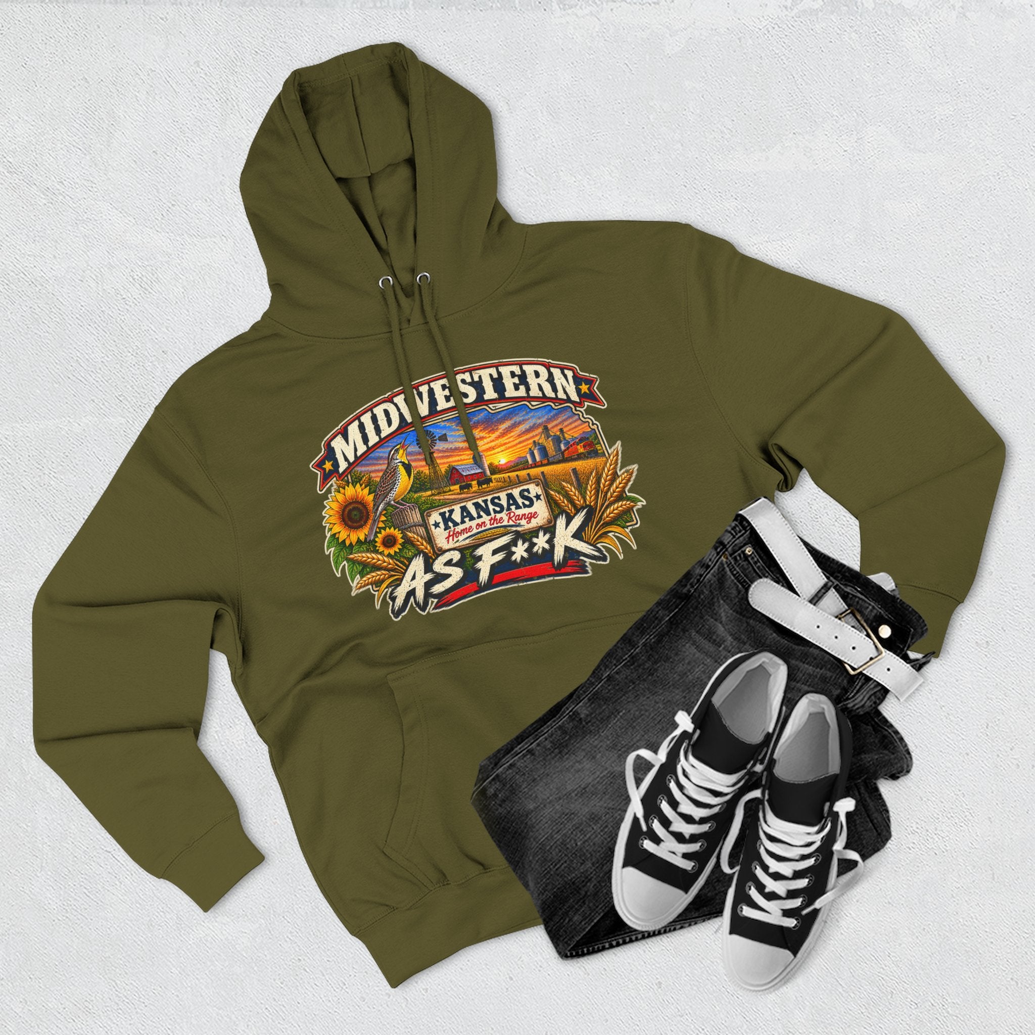 Army green Kansas As F**K hoodie flat-lay with black jeans and high-top sneakers