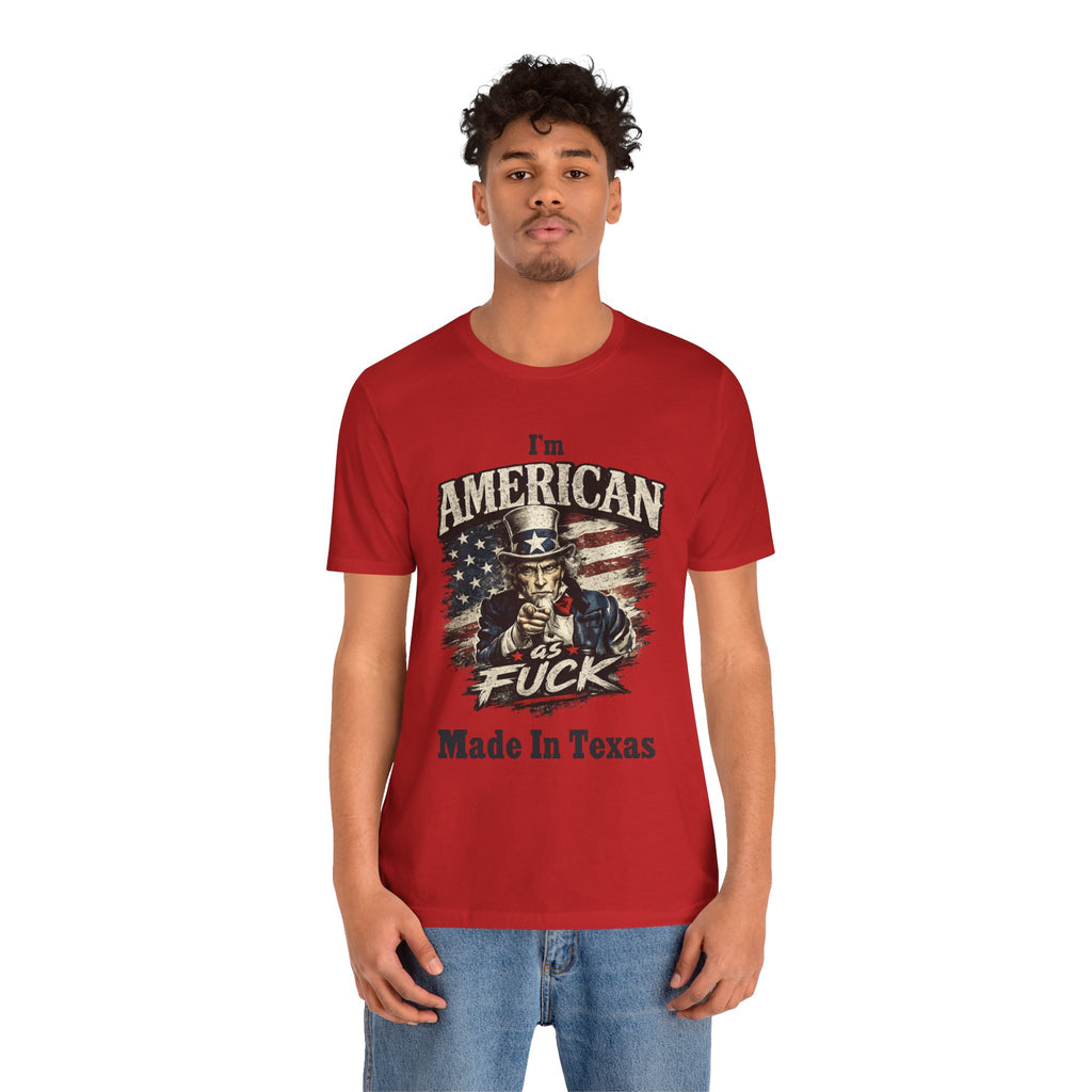 Red tee worn by male model, Uncle Sam graphic with "I'm American As Fuck, Made In Texas" text