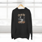 Black Country AF hoodie on a wooden hanger by a window
