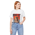 Woman wearing the White Feral AF tee with jeans, hands in pockets, front graphic centred